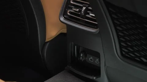 The camera slowly moves around the interior of a premium car.  Stock Footage 270486287