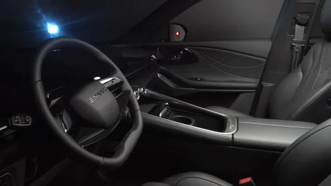 The camera slowly moves around the interior of a new car in a dark studio Stock Footage 280552709