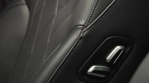 The camera slowly moves around the interior of a new car in a dark studio Stock Footage 280552719