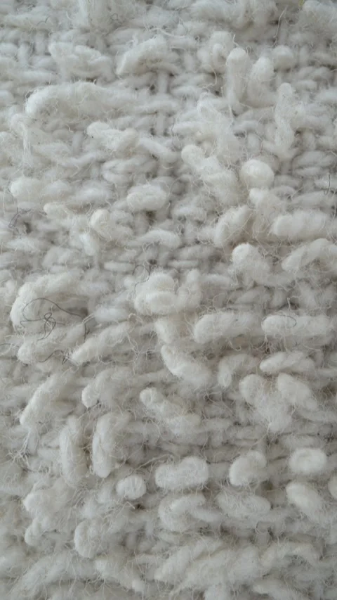 Camera slowly pans across soft white terry towel texture Stock Footage 340670417