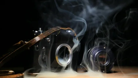 Camera smoke dark background hd footage Stock Footage 105682593