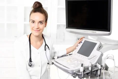 Camera sonogram, the doctor performing the sonogram examination Stock-Fotos