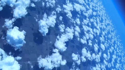 Camera Spinning and Falling From Outer Space 動画素材 127998606