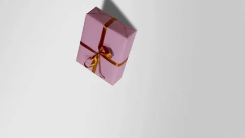 Camera spinning. Violet gift with an orange ribbon on a white background. Stock-Footage 142138643