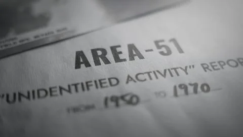 Camera spins over retro looking government Area 51 of UFO activity report file Stockbeeldmateriaal 334044862