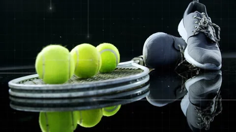 Camera starting low-angle tracking highlighting tennis racket balls shoes Stock Footage 311085400