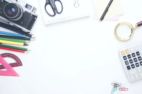 Camera with stationary on table Stock Photos