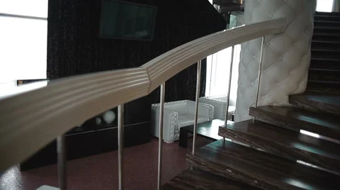 Camera on steadicam climbing marble staircase luxurious.Steadicam shot.  Stock Footage 54441144