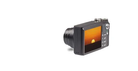 Camera with sunset on white Stock Photos