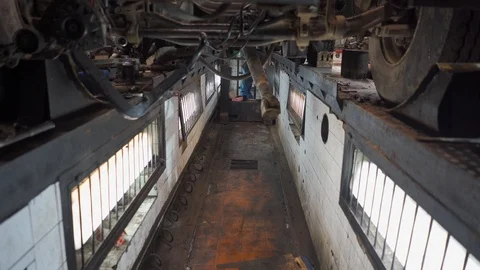 Camera sweep in the pit auto service Stock Footage 102868530