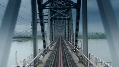 Camera sweeps across the railway bridge Stockbeeldmateriaal 71952929