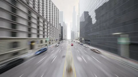 The camera sweeps down the street of a modern technological city and manages to Video stock 260410924