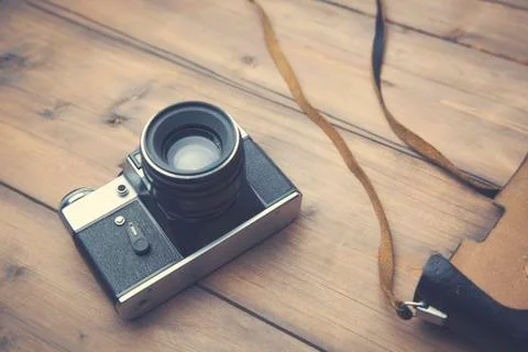 Camera  on  table Stock Photos