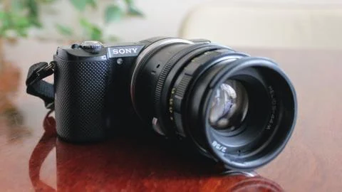 A camera on the table Stock Photos
