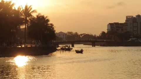 The camera takes boats on the river at sunset Stock Footage 128277394
