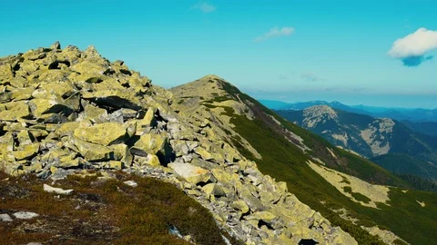 Camera takes panoramic view from peak of Carpathian mountain range Stock Footage 110807699