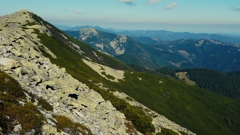 Camera takes panoramic view from peak of Carpathian mountain range Stock Footage 110808145