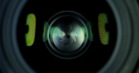 Camera Taking Photos As Yellow And Green Lights Reflect Off The Glass In Camera Stock Footage 113356415