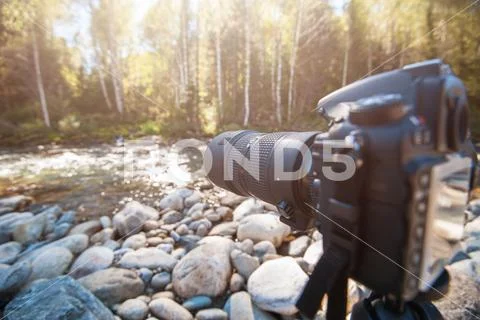 Camera with telephoto lens Stock Photos