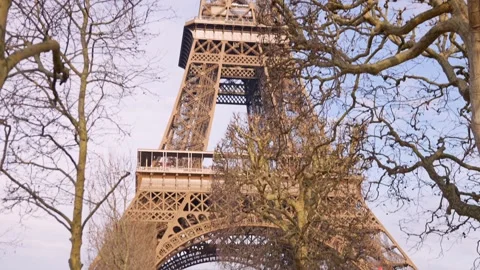 Camera tilt up from base of Eiffel Tower in winter in Paris on February 5 2025 Stock Footage 314041250