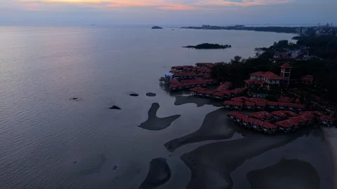 Camera tilt up transition from beach to sea in Port Dickson Stock Footage 302812187