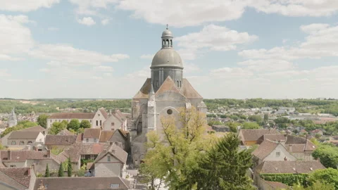 Camera Tilting Up Across Historic Rooftops Towards Saint Quiriace Collegiate Chu Vídeo Stock 340636557