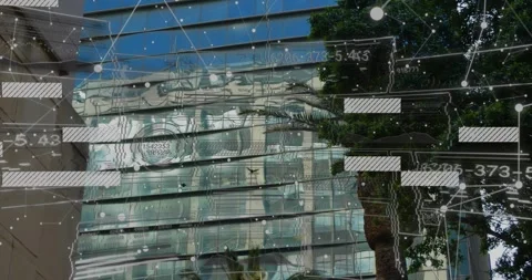 Camera tilting upward starting data overlay glass office tower hosting sliding Stock Footage 333904443
