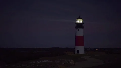 Camera Tilts Down From Starry Night Sky, To Reveal Sankaty Head Light House Stock Footage 73781008