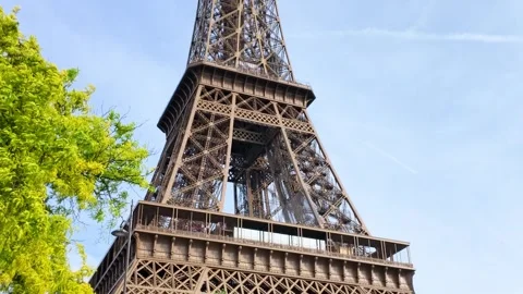 Camera Tilts Up From Market Stalls To The Eiffel Tower In Paris Stock Footage 334827691