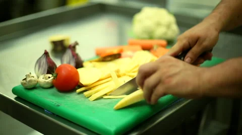Camera Track Past Chef Preparing Vegetables 2 Stock Footage 44085123
