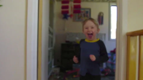 Camera tracking in front, kid jumps into arms of mom Stock Footage 64645443