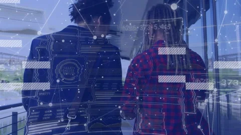 Camera tracking two men walking toward entrance, tech overlay animating nodes Stock Footage 321979456