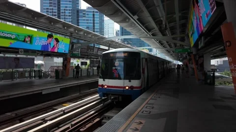 Camera tracks a BTS train pulling into Nana station Stock Footage 300174072