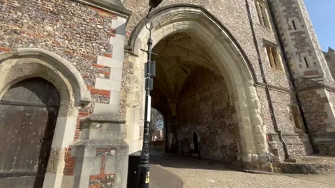 Camera tracks through the old gatehouse on a sunny Spring day 스톡 동영상 151451650