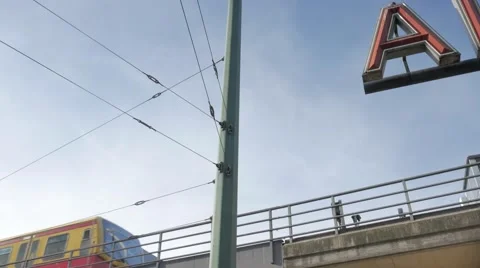 Camera tracks train into Alexanderplatz station in Berlin Stock Footage 58942885