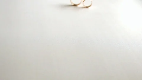 Camera travel past two gold rings Stock Footage 102709464