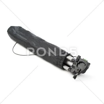 Camera tripod in cover over isolated white background Stock Photos