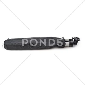 Camera tripod in cover over isolated white background Stock Photos