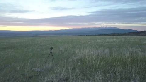 Camera on tripod in a field Stock Footage 166271760