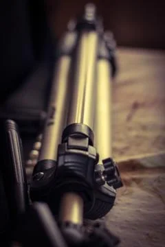 Camera tripod folded up with blur Stock Photos