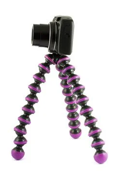 Camera on a tripod isolated on a white background Stock Photos