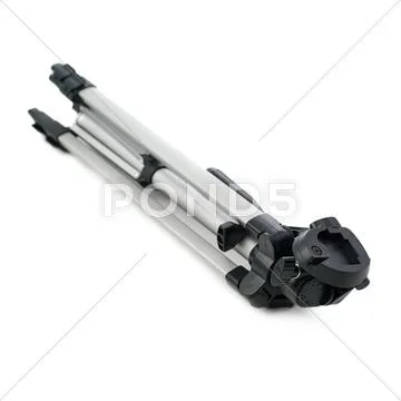 Camera tripod over isolated white background Stock Photos