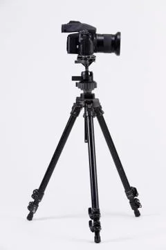 Camera with tripod Stock Photos
