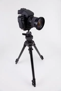 Camera with tripod Stock Photos