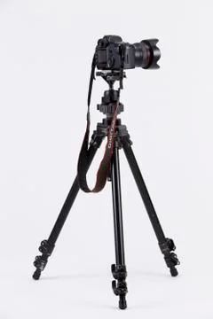 Camera with tripod Stock Photos
