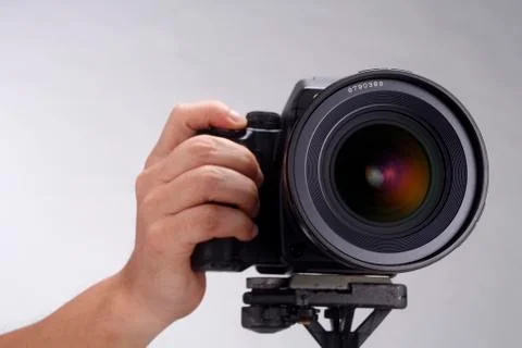 Camera with tripod Stock-Fotos