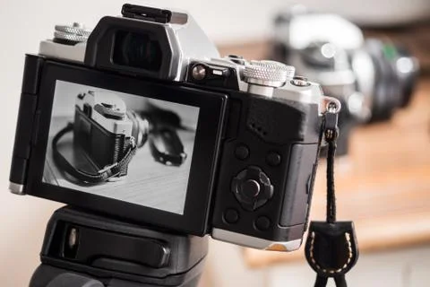 Camera on tripod Stock Photos