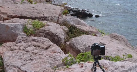 Camera on tripod positioned to take a time lapse of the panorama of Leuca, Ap Vídeo Stock 160267320