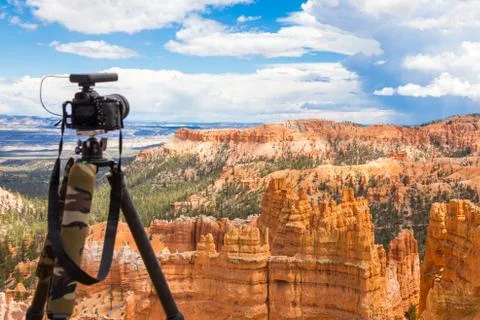 Camera on tripod ready to shoot in Bryce Canyon National Park at daytime, Utah Stock Photos