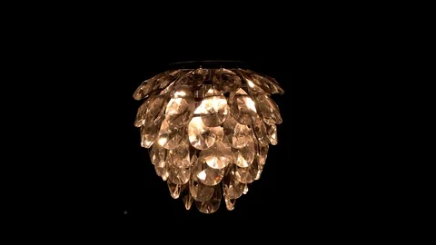 Camera turning around a beautiful and shining chandelier Stock Footage 121040408